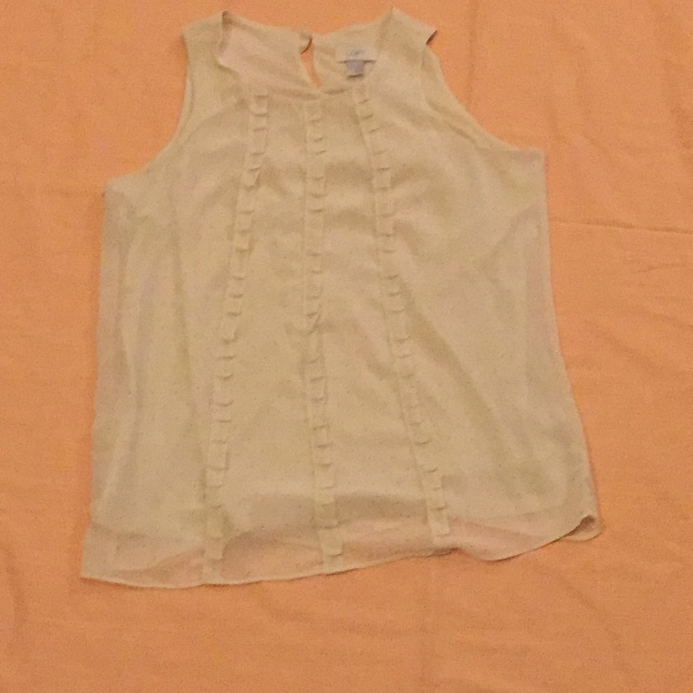 Off white with tiny apricot dots top